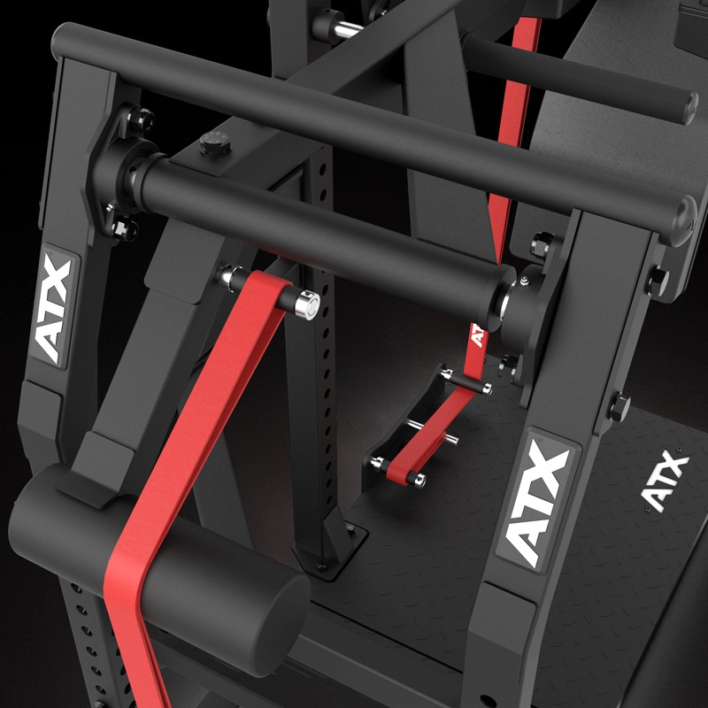 Close-up of the ATX® Pendulum Squat Machine in black and red, featuring padded rollers, handles, and a sturdy metal frame for strength training. The ATX® logo appears on several parts of the equipment.