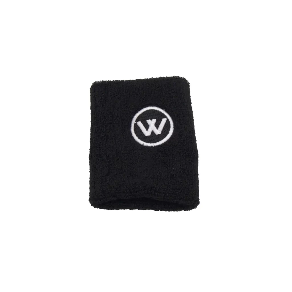 The Kettlebell Wrist Guard is a black wristband with a white circular logo featuring the letter W in the center, shown against a plain white background.