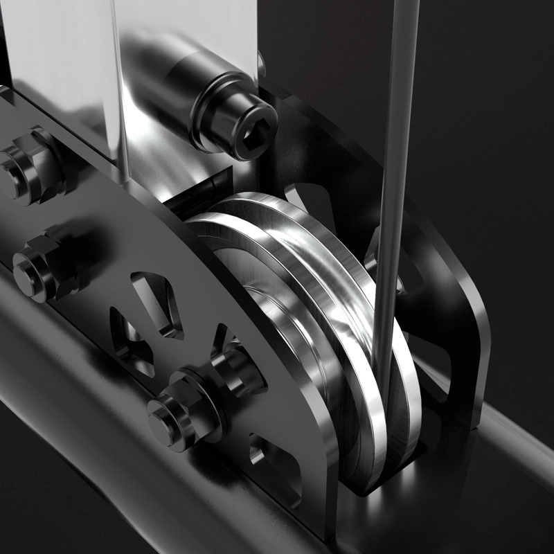 Close-up view of a shiny metal pulley system with a grooved wheel, bolts, and a wire or cable running through it, set against a dark background.