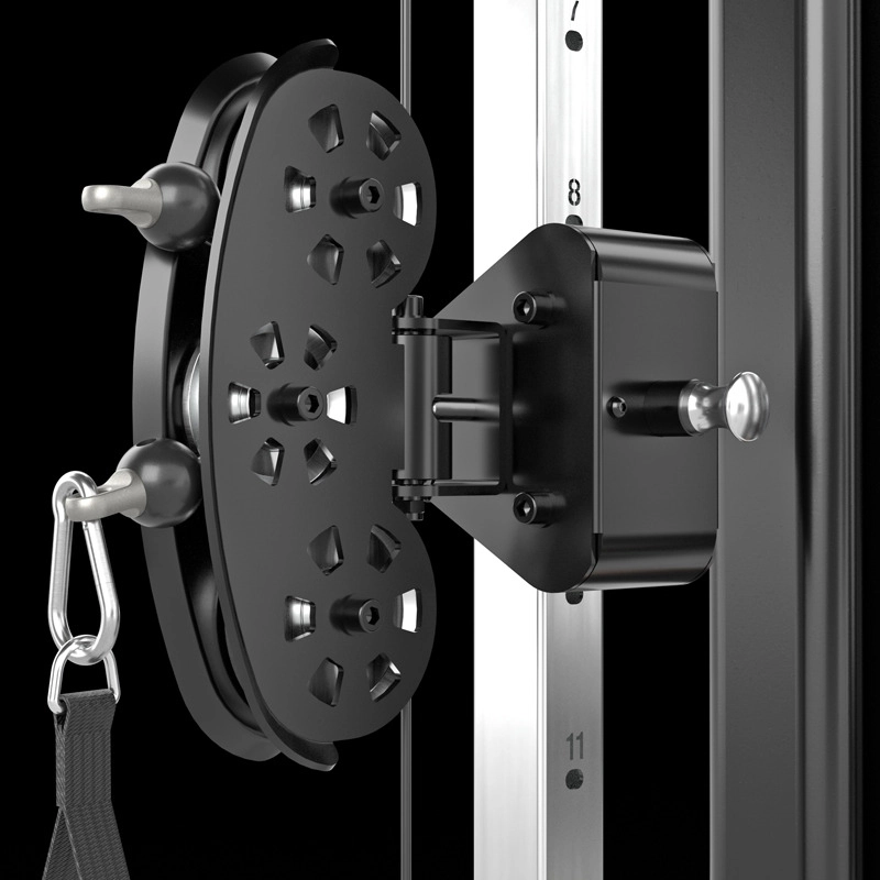 Close-up of an adjustable pulley system on a fitness machine, featuring a black rotating plate with multiple holes, two silver adjustment pins, a metal carabiner, and a numbered vertical track.