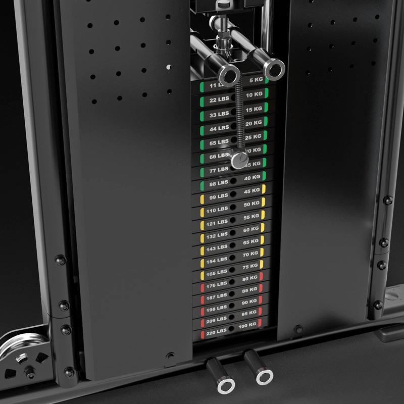 Close-up of a weight stack on a gym machine, showing labeled weight plates in pounds and kilograms, with color-coded labels and metal rods for selecting the desired weight.