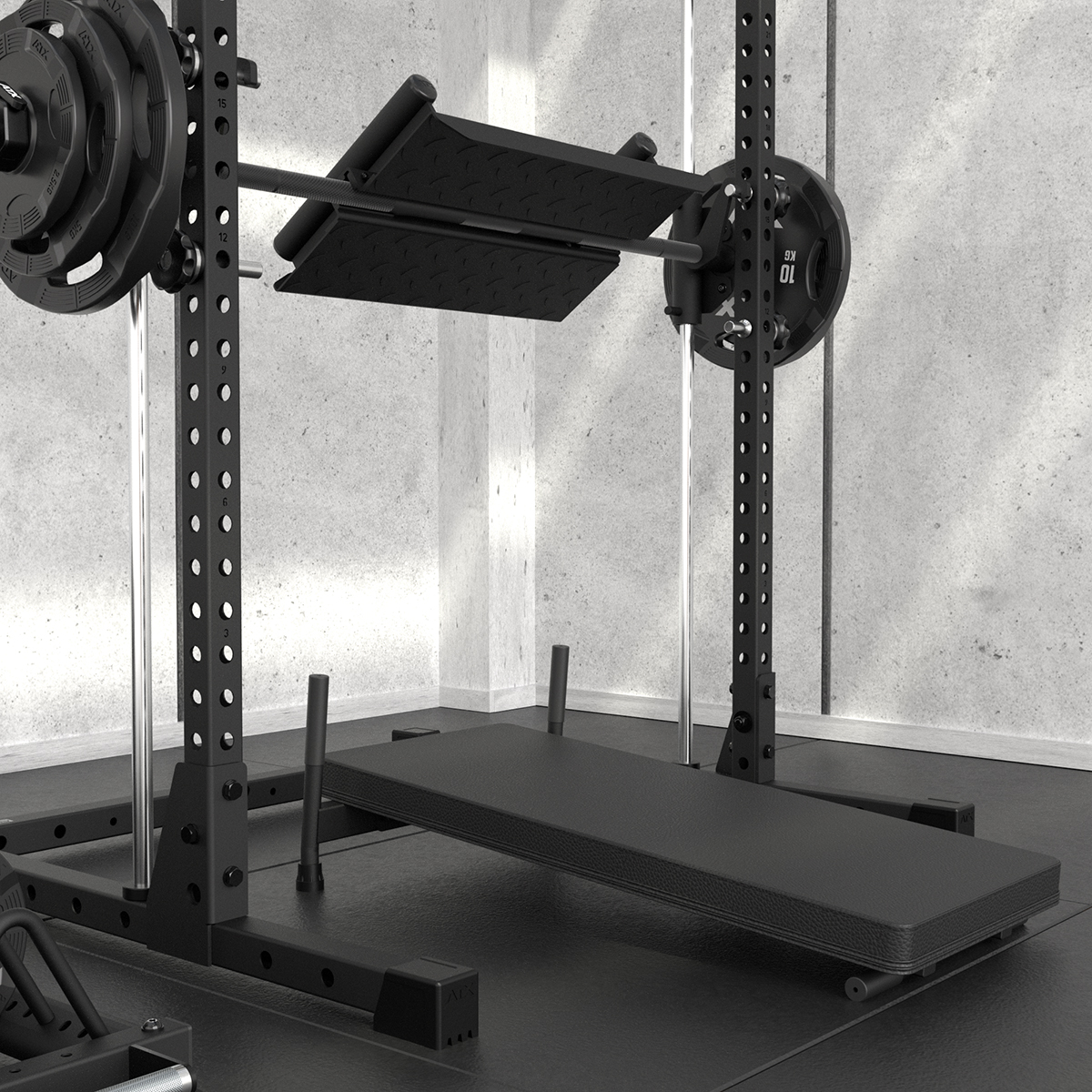 A black leg press machine with weight plates is positioned in a minimalist gym with concrete walls and black flooring. The machine has a padded bench and angled footplate.