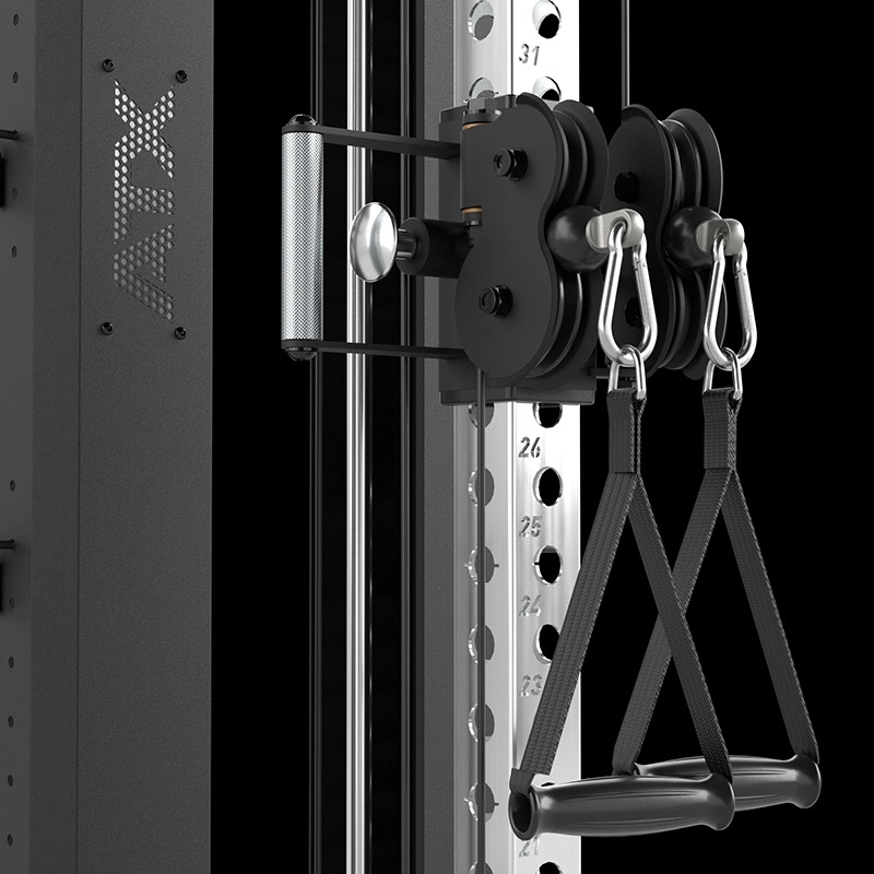 Close-up of the ATX® Single Cable Station - Wall Mounted, featuring adjustable height settings, metal carabiners, black handles, and a textured metal frame. Adjustment numbers are visible on the vertical bar.