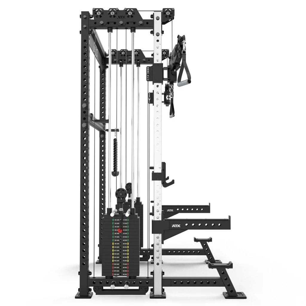 A black and white multifunctional power rack gym station with weight stacks, pulleys, resistance bands, and various attachments for strength training exercises, viewed from the side.
