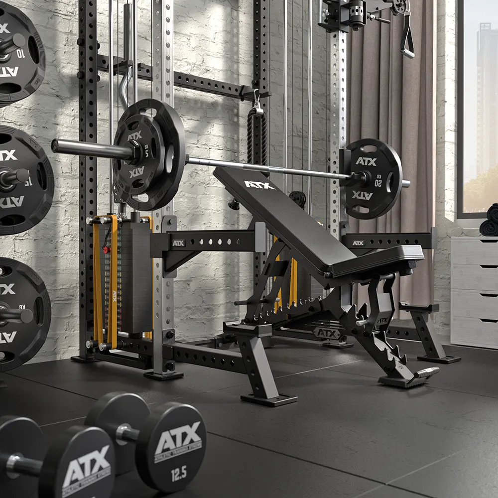 A modern home gym with a weight bench, barbell and weights, dumbbells, and various gym equipment set against a light brick wall and large window, letting in natural light.