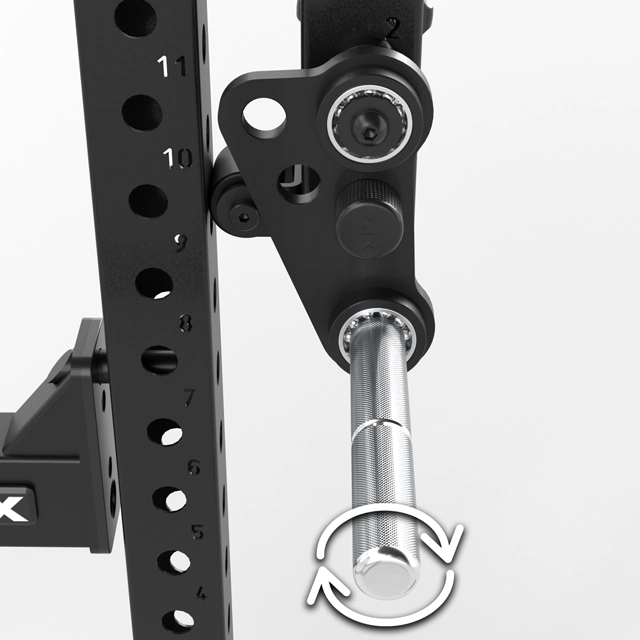 Close-up of a gym rack adjustment mechanism with a metal lever inserted into a hole, numbered vertical holes, and an arrow indicating rotational movement for adjustment or locking.
