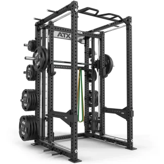 A black ATX power rack loaded with weight plates, featuring a pull-up bar on top, safety bars, and adjustable hooks inside; resistance bands hang from the center.
