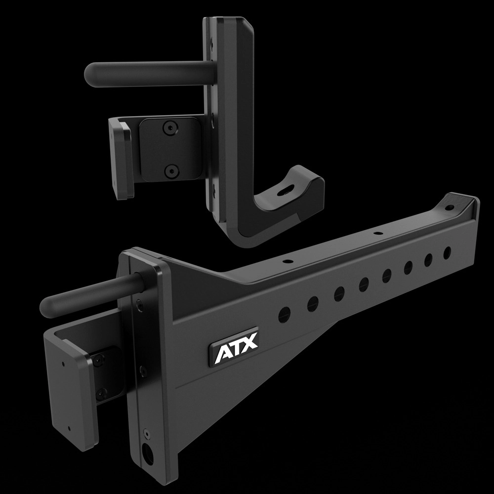 A pair of black metal J-cups or hooks with protective rubber coating, designed for holding barbells on a squat rack. The ATX logo is visible on one hook. The background is solid black.