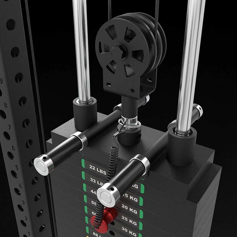 Close-up of a weight stack on a gym machine with labeled weight plates in pounds and kilograms, metal guide rods, a pulley system, and a pin for adjusting the weights.