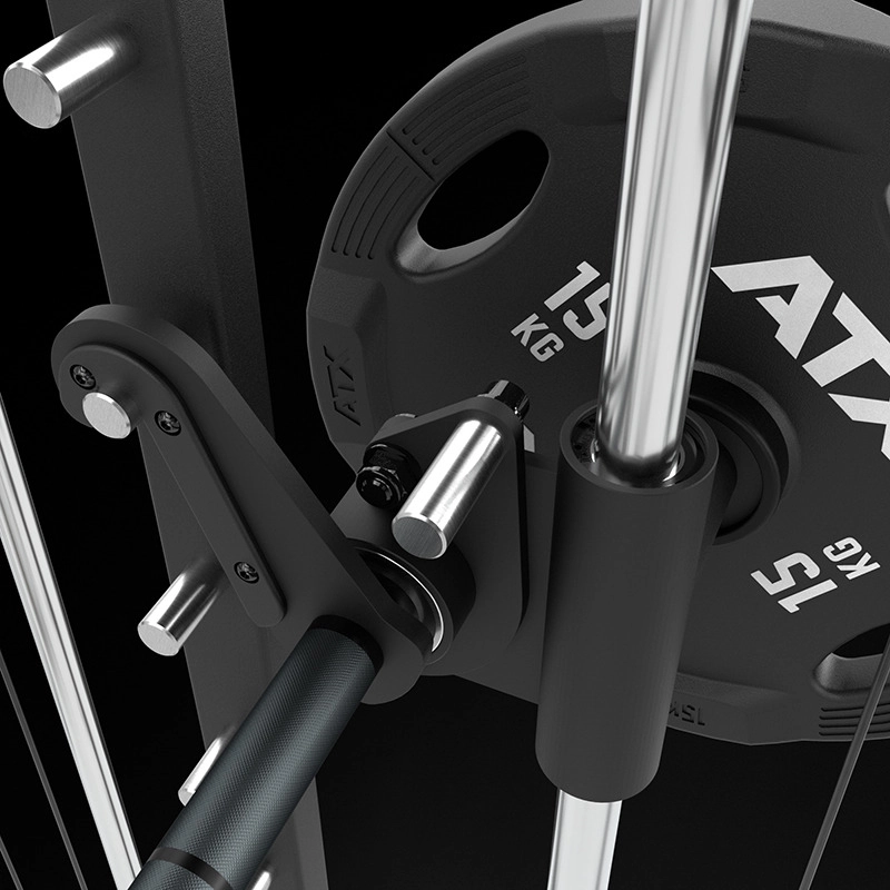 Close-up of a gym machine with a barbell, a 15 kg weight plate, and metallic supports. The equipment appears sturdy and sleek, designed for strength training exercises.
