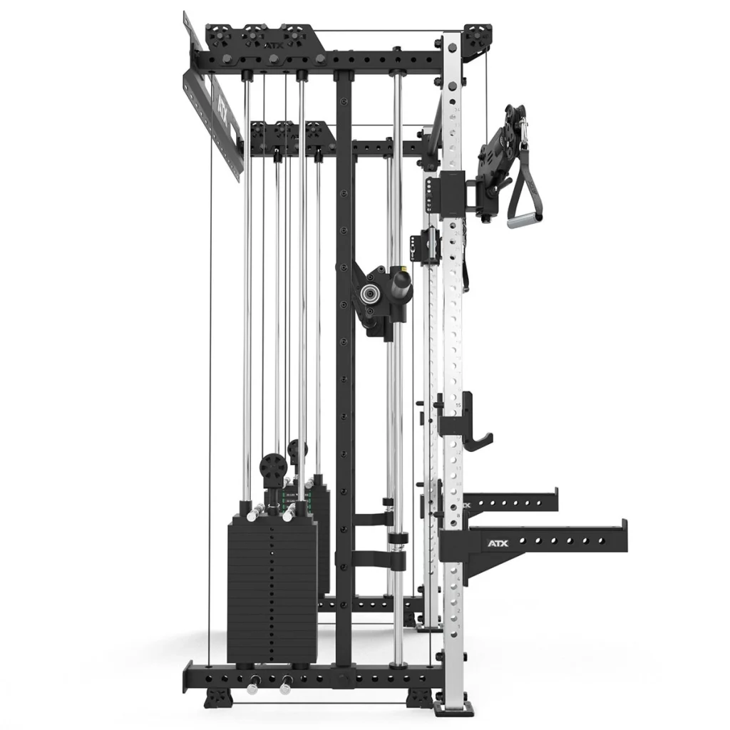 A side view of the ATX® Squat Rack with Cables, a multi-functional gym machine featuring weight stacks, pulleys, handles, and attachments for strength training. The sturdy frame is black with sleek silver accents.