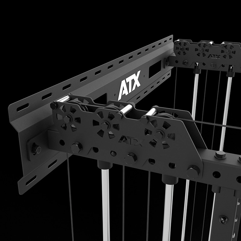 Close-up of the ATX® Squat Rack with Cables (Copy), showcasing its black metal frame, multiple bolts, rods, and support brackets, all set against a dark background with the ATX logo visible.
