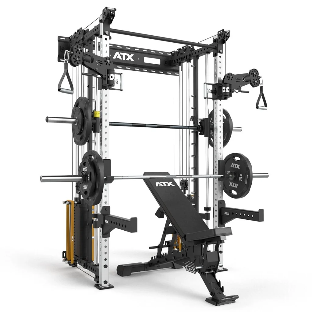 The ATX® Squat Rack with Cables features a black and silver frame, adjustable bench, weight plates, cables, pulleys, and barbell holders—designed for versatile strength training exercises.