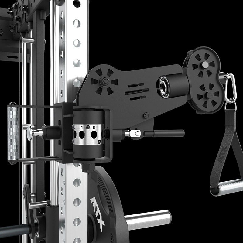 Close-up of the ATX® Squat Rack with Cables (Copy), a black and silver adjustable fitness attachment mounted on a squat rack, featuring pulleys, cables, and a handle strap against a black background.