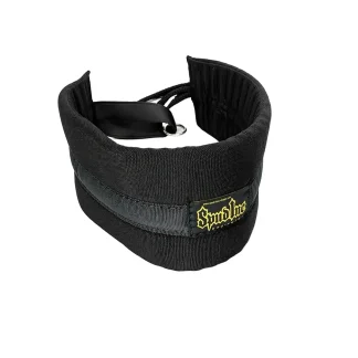 The Spud Belt Squat Belt PILLOW Adjustable is a black padded collar with an adjustable strap and metal ring, featuring a yellow embroidered "Symbolic" patch on the front. Inspired by squat belt designs, it’s shown against a white background.