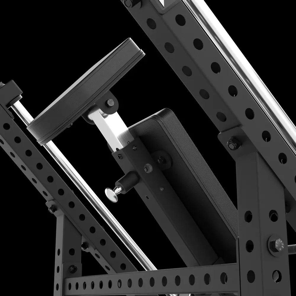 Close-up of a black, metal leg press machine with padded backrest and footplate, featuring multiple adjustment holes and sturdy construction, set against a black background.