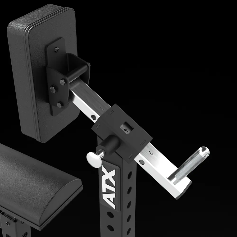 Adjustable gym equipment attachment with a padded black arm support, silver adjustment bar, and handle, mounted on a black vertical frame labeled ATX against a black background.