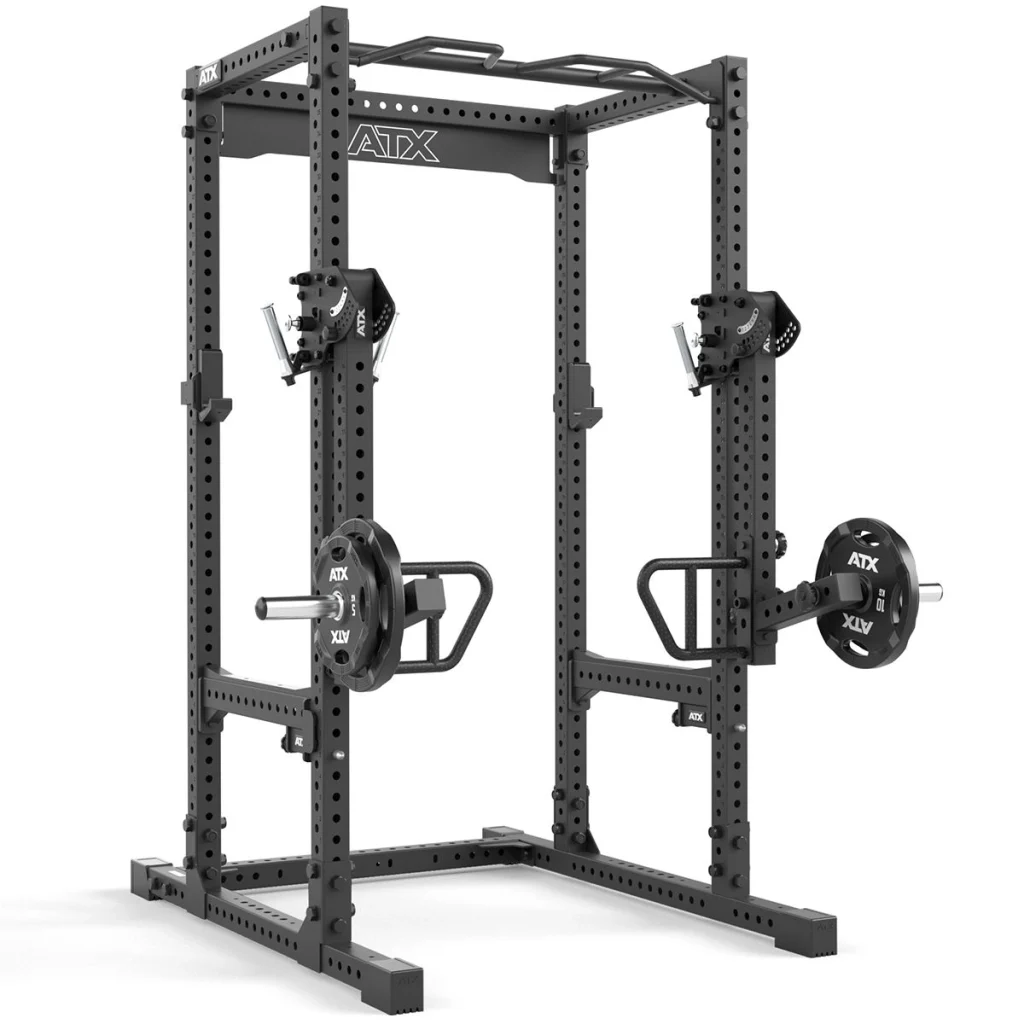 The ATX® Jammers 3D Roller 700 Series is a black metal power rack featuring adjustable safety bars, 3D jammer arms, weight plate holders, and pull-up bars, with two plates loaded per side—ideal for strength training and weightlifting.