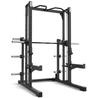 Black ATX Commercial Smith Machine rack with an integrated barbell, pull-up bar, weight plate storage pegs, and J-hooks.