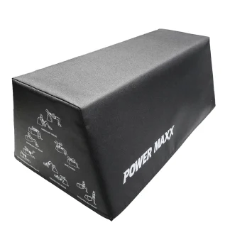 Black trapezoidal foam exercise block with POWER MAXX branding and small illustrated workout instructions printed on the side.