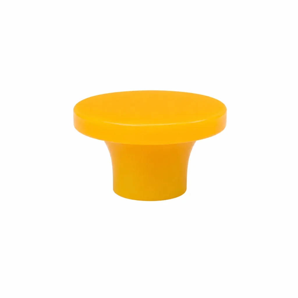 A bright yellow, round, flat-topped plastic knob with a flared base, set against a plain white background.