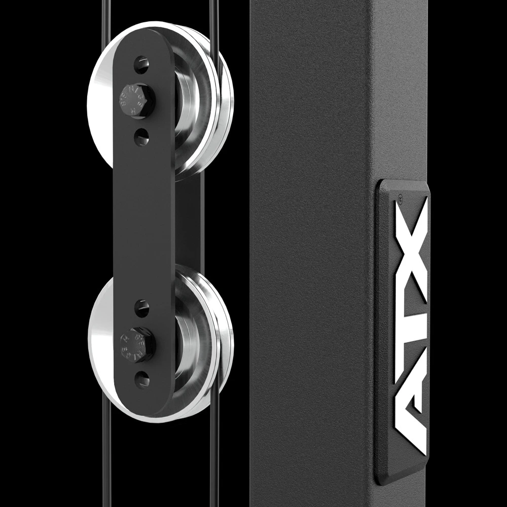 Close-up of the ball-bearing aluminium pulley wheel on the ATX? Lat Pulldown Seated Row Machine, designed for smooth, jerk-free cable movement.