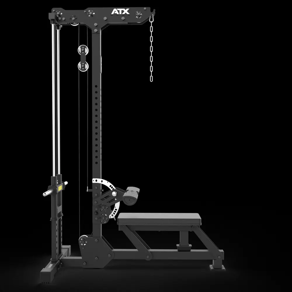 The ATX Lat Pulldown Seated Row Machine, featuring a cable and pulley system, adjustable bench, and chain, is showcased here in black against a black background.