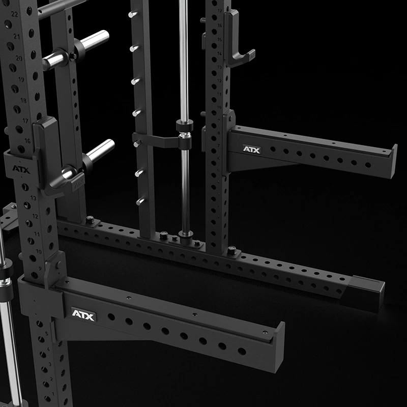 Close-up of the ATX® branded J-hook and spotter arm assembly with laser-etched number scale on the Commercial Smith Machine.