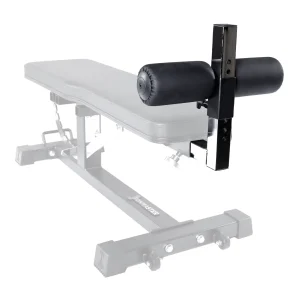 A close-up of a padded black leg roller attachment mounted on the end of a workout bench, with the bench shown in grayscale and partially faded in the background.