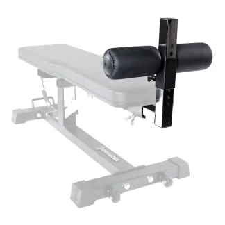 A close-up of a padded black leg roller attachment mounted on the end of a workout bench, with the bench shown in grayscale and partially faded in the background.